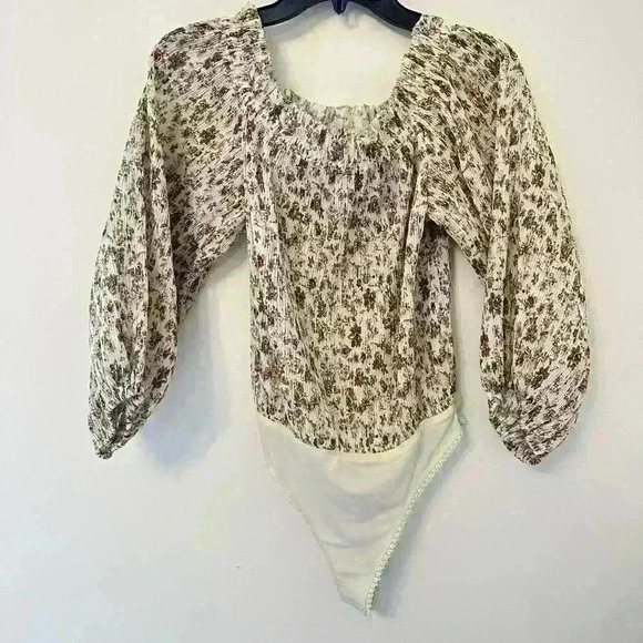 Pretty Petal Bodysuit
Free People - Picture 5 of 7